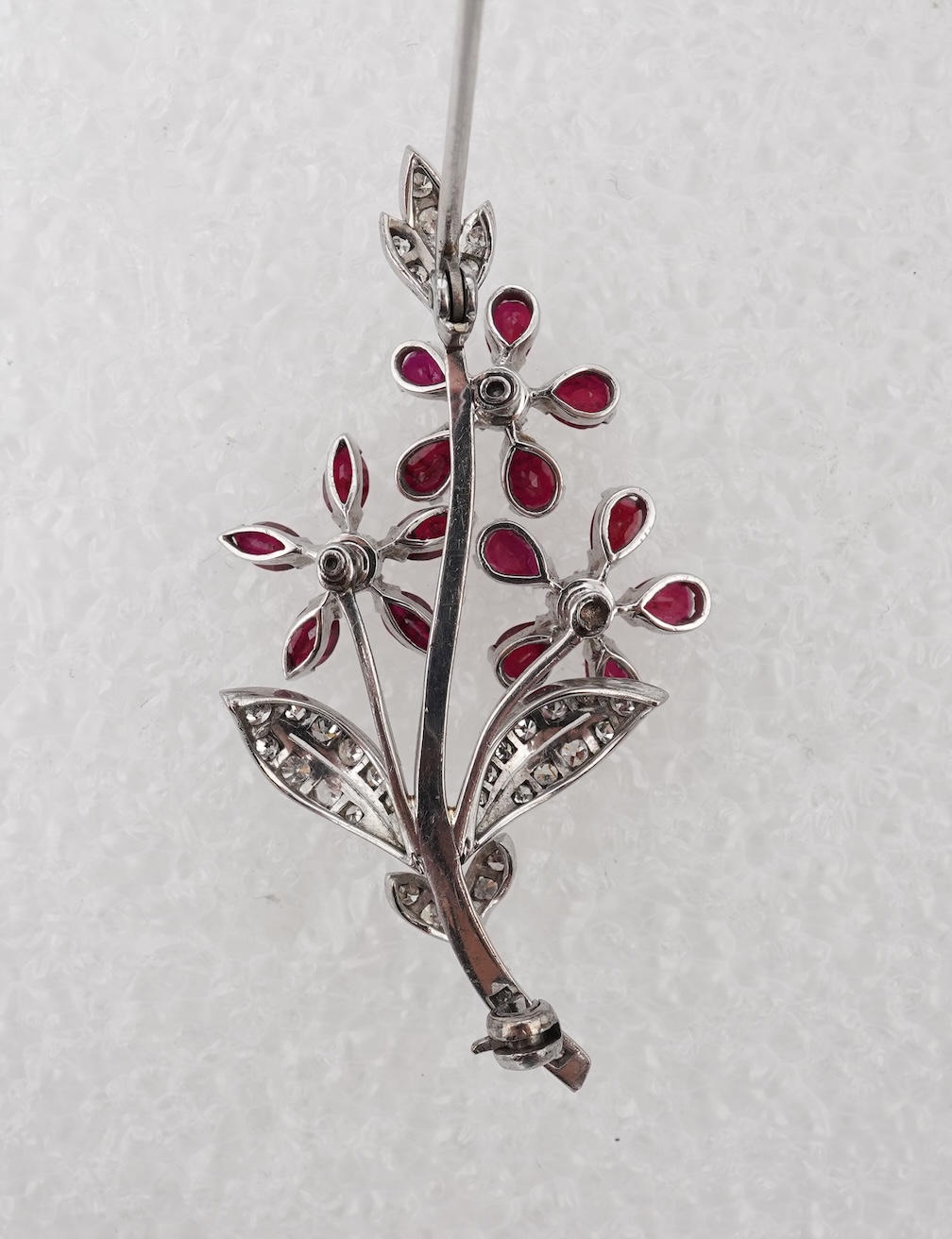 A ruby and diamond floral spray brooch